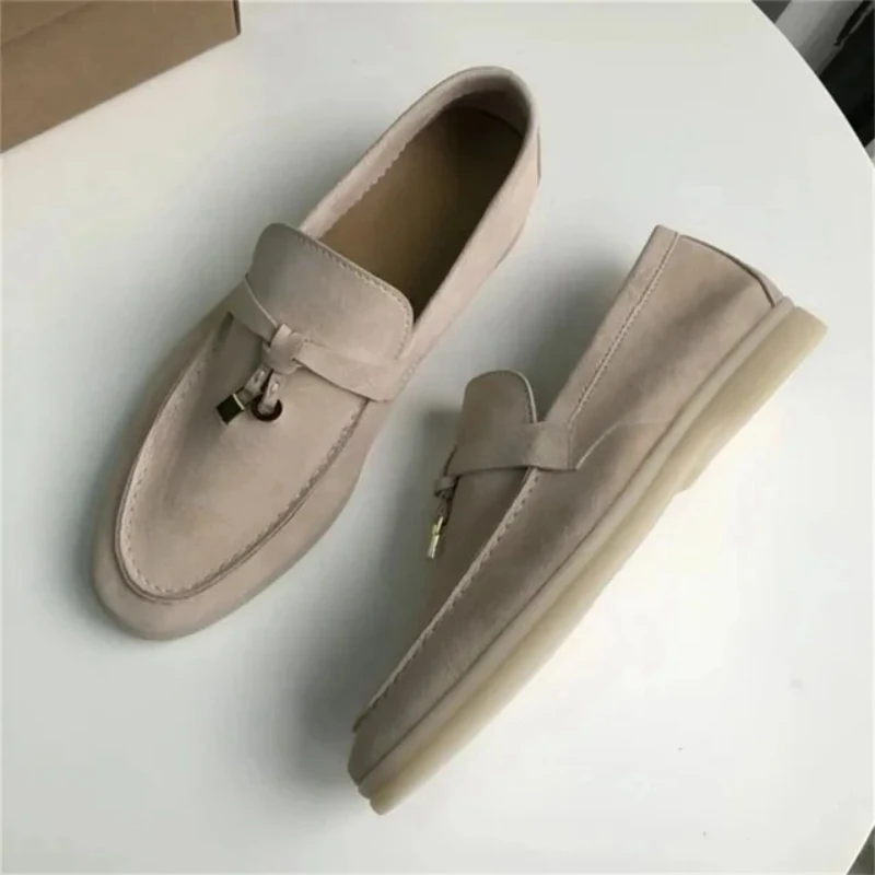 Mocasines informales de piel de ciervo de alta calidad para mujer, zapatos de suela plana con hebilla de borla, para caminar y conducir, novedad de verano