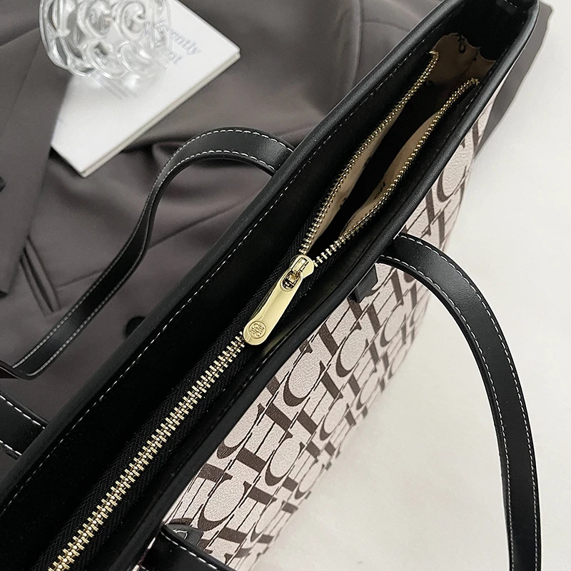 Luxury women's zipper shoulder bag, fashionable classic large capacity shopping bag, creating a daily exquisite style