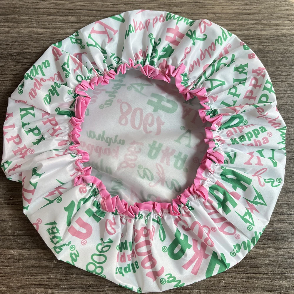 Sisters Association of University Club Members organizes Greek letters to design shower cap and nightcaps