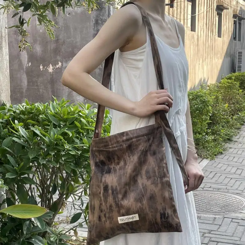 

2025 New French Retro Tie Dye Printed Faux Suede Velvet Shoulder Bags For Women Personalized And High-end Crossbody Bags Trendy