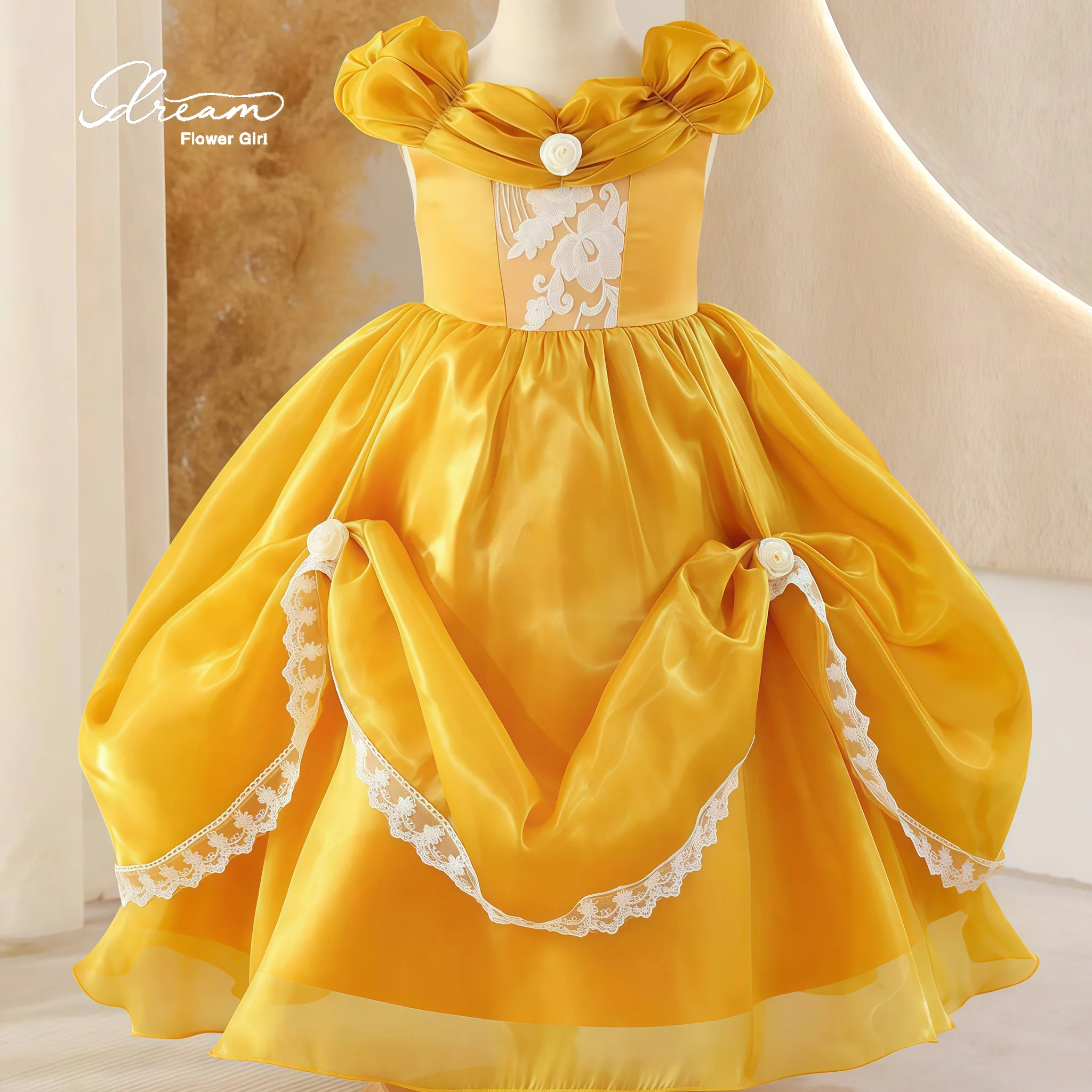 Yellow floor-length formal ball gown for girls featuring puff sleeves a full skirt and lace appliqué detailing