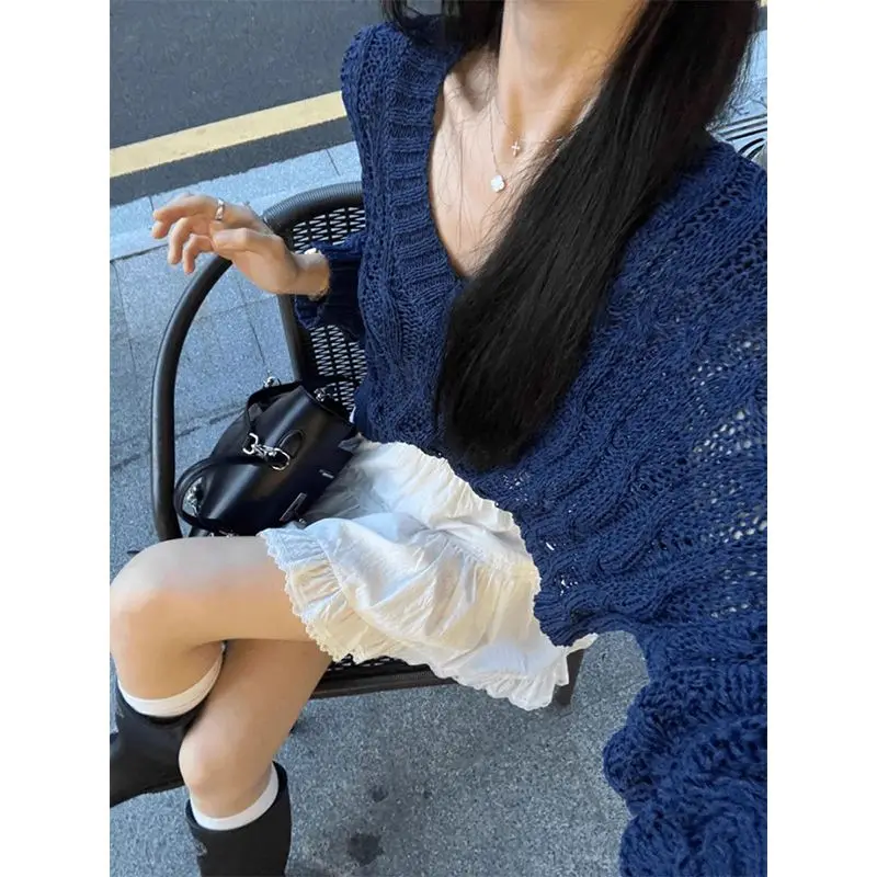 التخسيس تصميم تحسس الجوف خارج ضوء محبوك سترة المرأة Sle أوائل الربيع Faion رقيقة جوفاء تريكو الأعلى