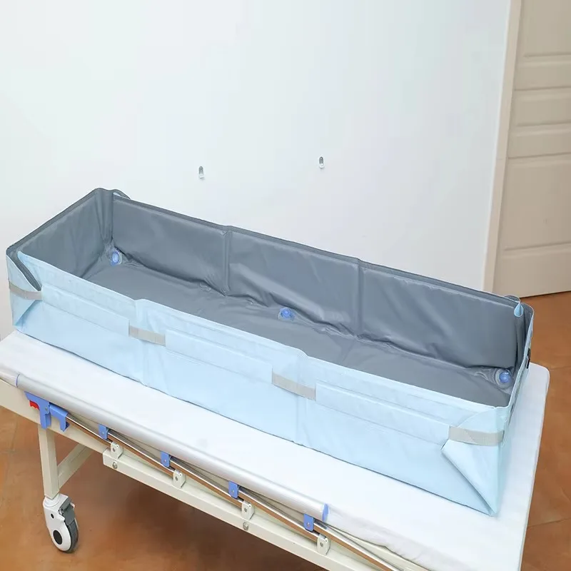 

Portable folding shower mattress assisted bath