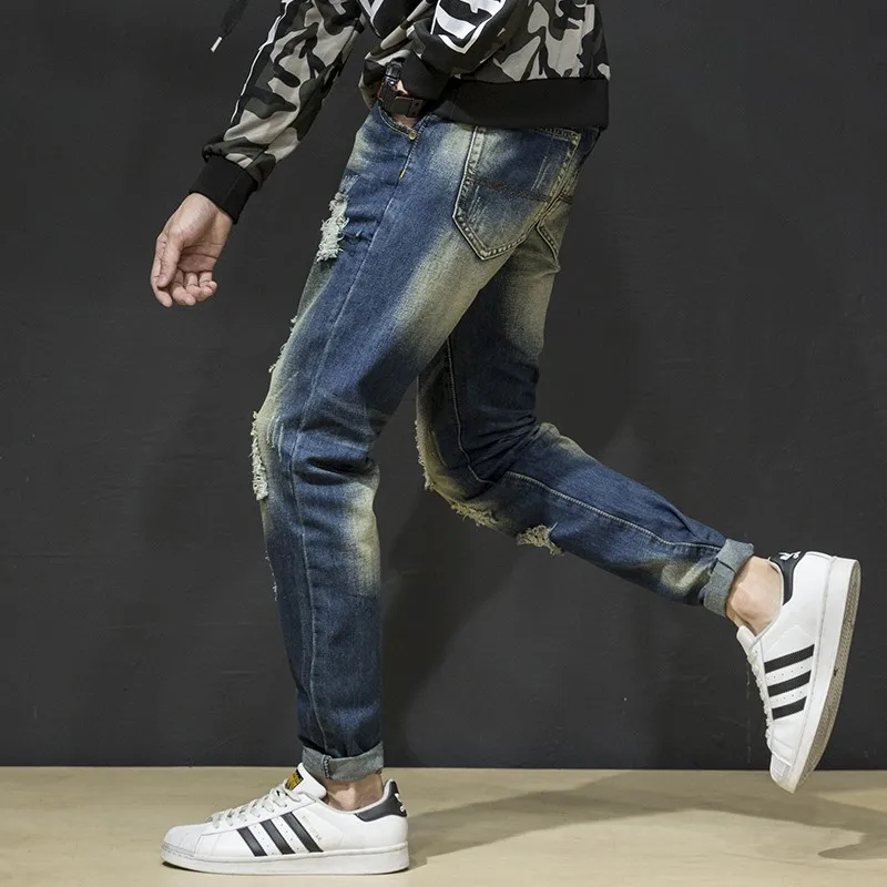 Jeans in Denim da uomo strappati di personalità nuovi pantaloni di marca Hip-Hop con foro rotto europeo e americano di grandi dimensioni maschili