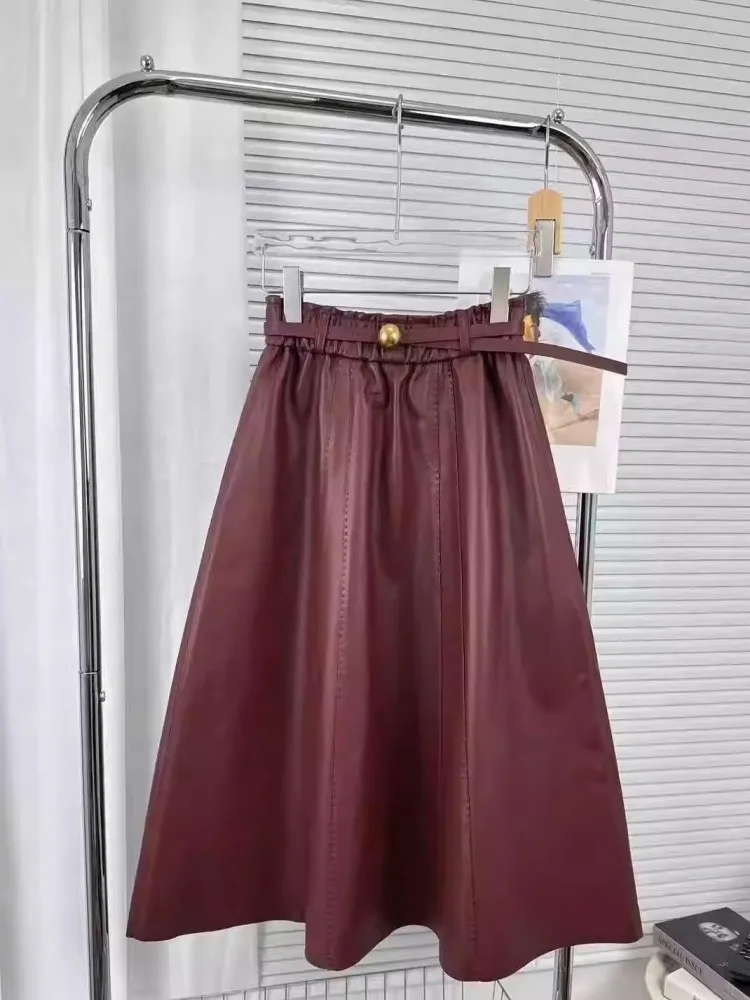 تنانير أنيقة من الجلد الطبيعي وشاحات عالية الخصر حزام منتصف العجل مكتب سيدة تنورة طويلة عالية الجودة جلد الغنم الطبيعي