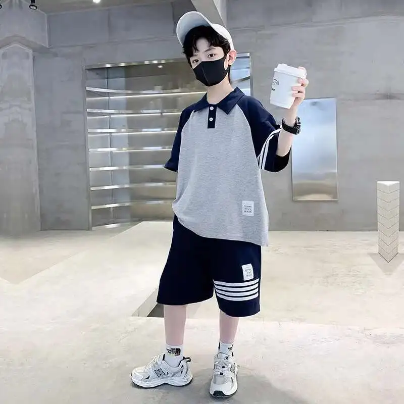 

Новый летний комплект поло для мальчиков-подростков, хлопковая детская одежда, костюм, рубашка-поло, шорты, комплект одежды из 2 предметов, детский повседневный спортивный костюм