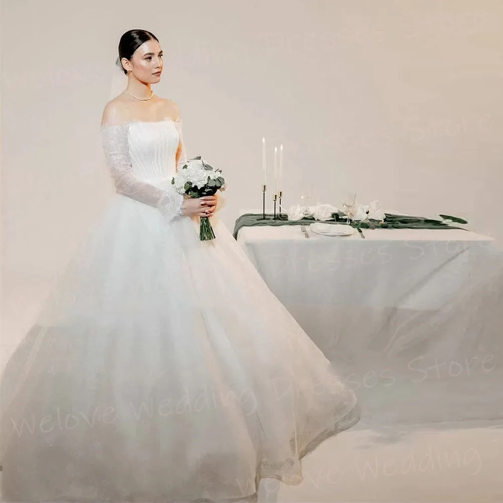 فساتين زفاف فاخرة على شكل حرف A للنساء من الدانتيل بدون أكتاف رداء De Mariée فساتين عروس مخصصة بأكمام طويلة فيستدو دي نوفيا