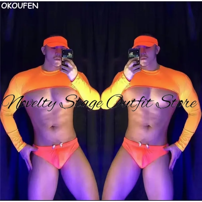 

Orange Nightclub Bar DJ Muscle Man Costume Top Shorts Cap Sexy Pole Dance Set DS Stage Performance Clothing Male Suit 2024