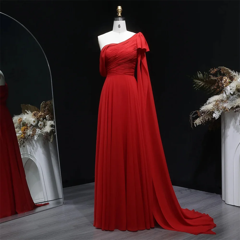 

Our tailor-made one-shoulder red floor-length gown comes with a tight waist. The beautiful outfit shines brightly and brings you