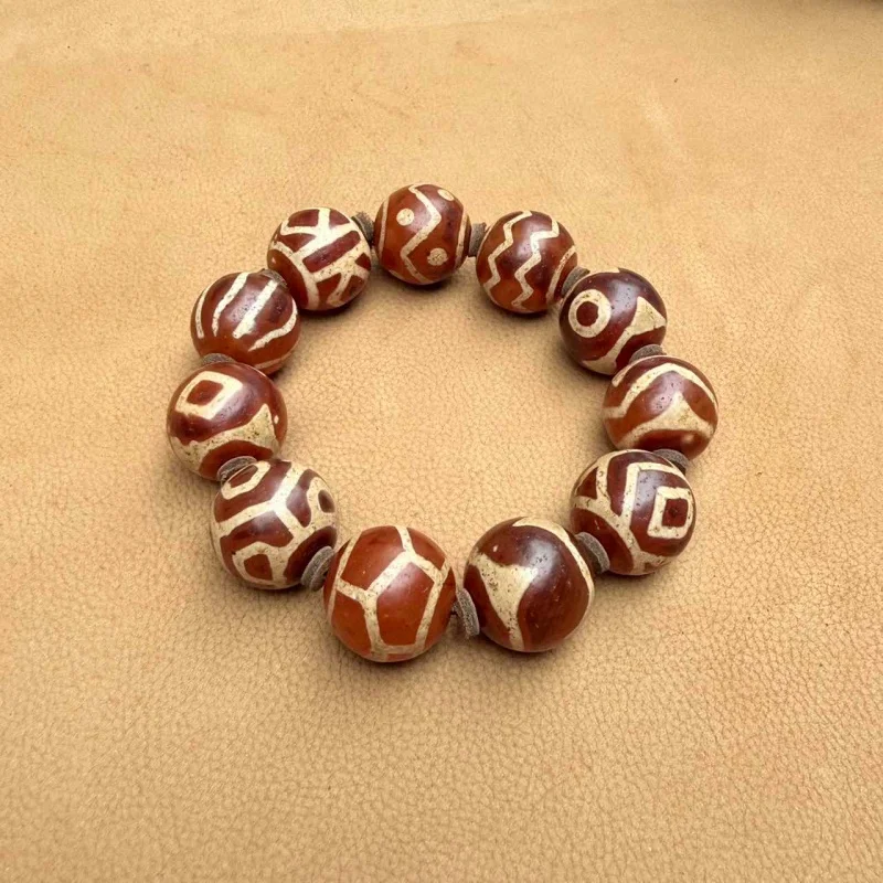 Dzi bead bracelet from West Asia, Nepalese Buddhist bead, weathered sample, old red agate, multiple totems