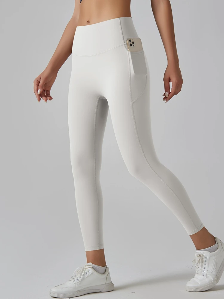 여성 의류 요가 레깅스 스포츠웨어 패션 캐주얼 솔리드 컬러 타이트 바지 여성용 포켓 달리기 피트니스 짐 롱 팬츠