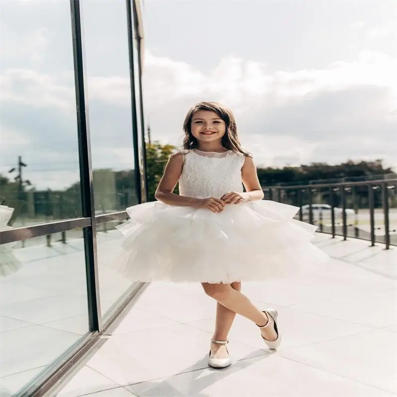 

Lovely A-Line Flower Girl Dresses For Wedding Lace Appliques Illusion Long Sleeves Princess Party First Communion Gowns