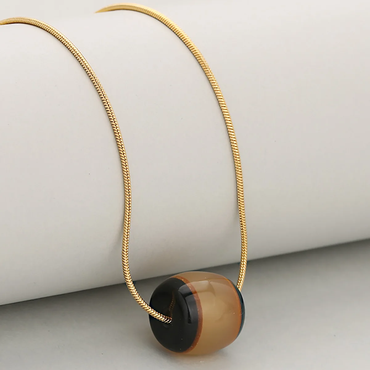 Simple & Unique Sheep Horn Color Black Edge Bead Pendant Stainless Steel Snake Chain Necklace for Women and Men