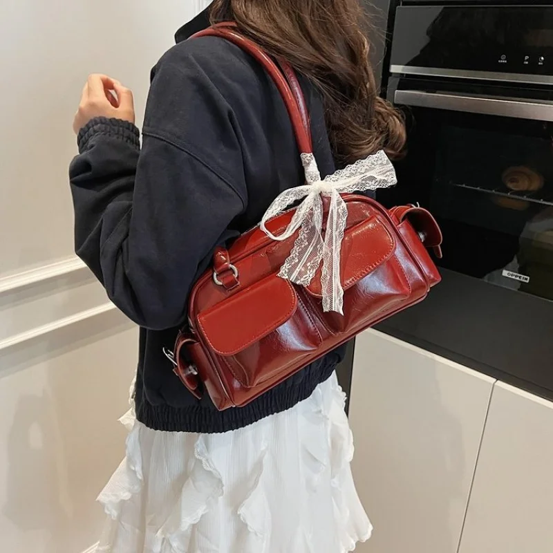 

Высококачественная женская сумка через плечо из тонкой кожи с простым винтажным дизайном и известным элегантным стилем ​