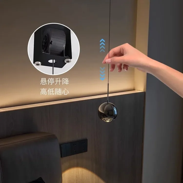 Modern simple and creative suspension lift hand sweep induction TV background wall bedside chandelier