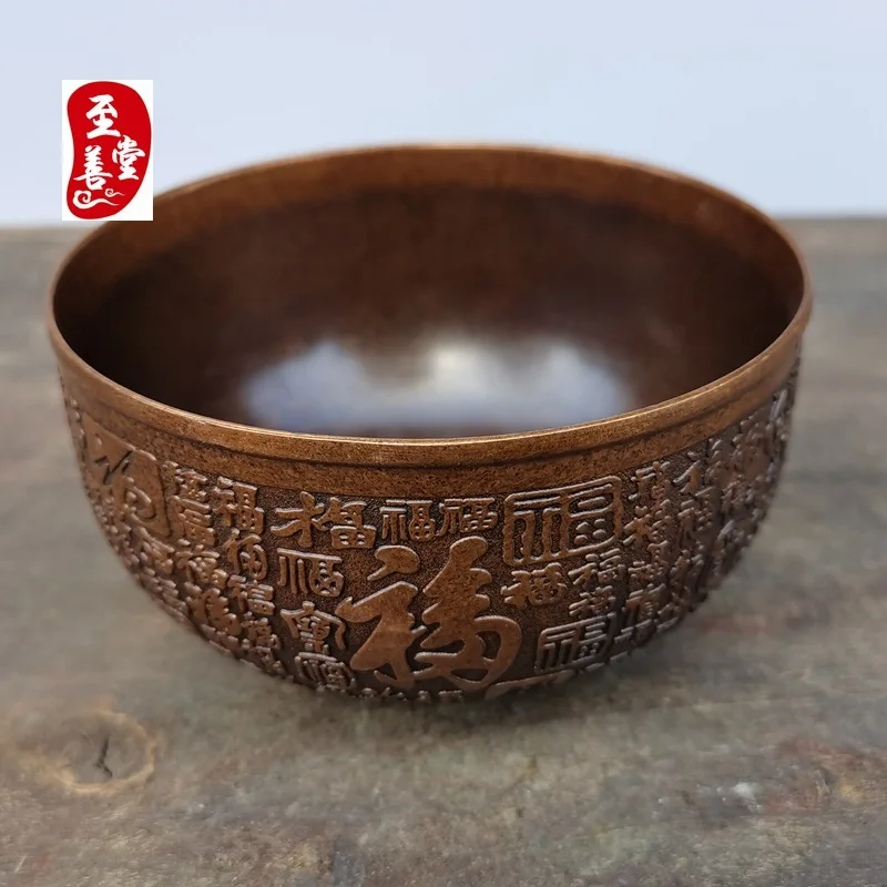 Antique-style bronze alloy decorative piece for living room, featuring an aged patina and relief carving of the 