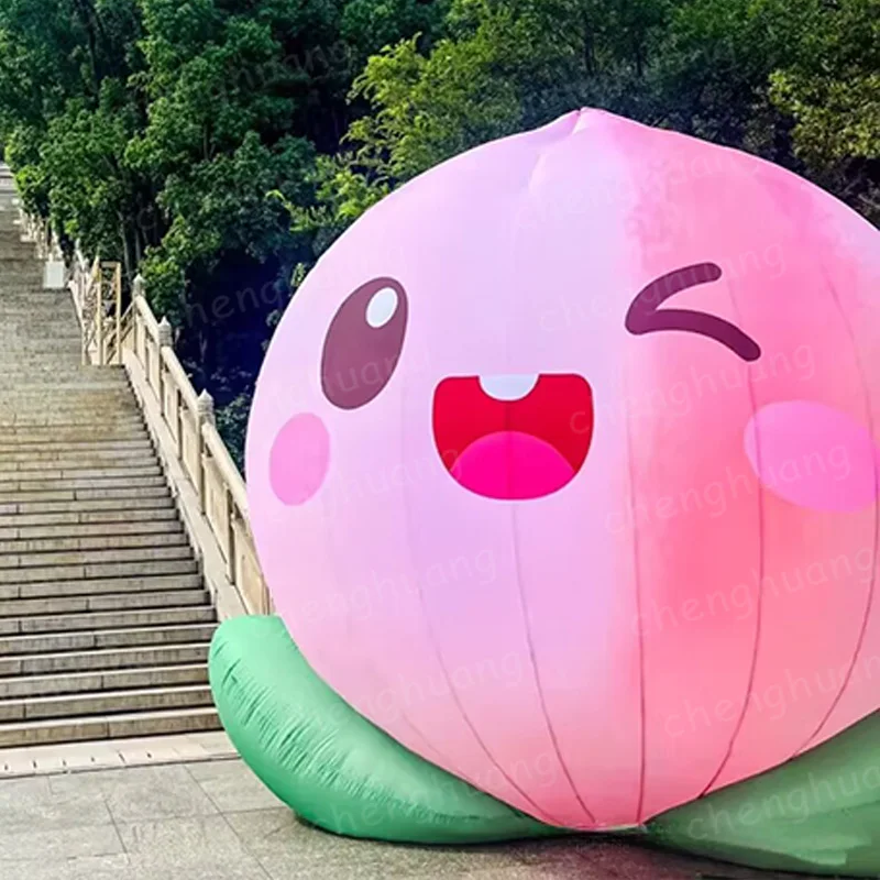 

Inflatable peaches, footballs with blowers, outdoor large-scale event promotional and decorative props
