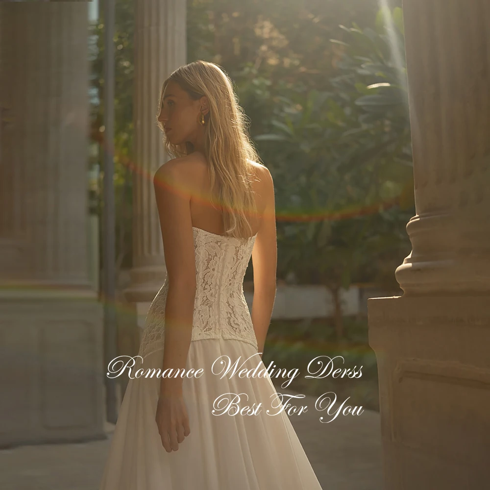 ชุดแต่งงานทรงเอไลน์ผ้าชีฟองประดับลูกไม้หรูหรา แขนกุด เปิดหลัง พร้อมผ้าคลุมไหล่แบบจีบ  สามารถสั่งตัดได้