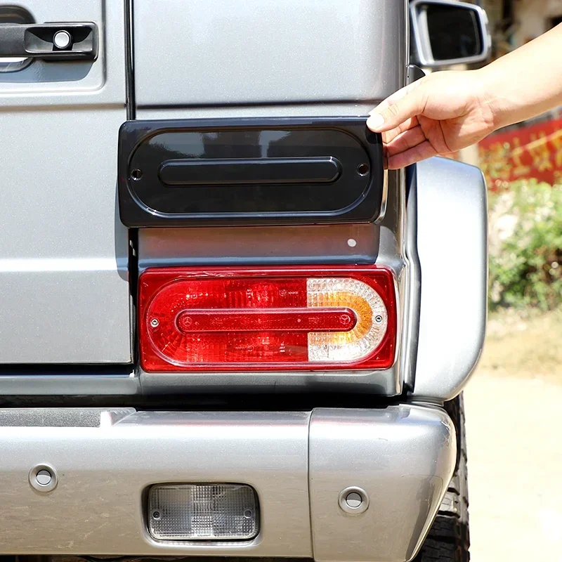 

Декоративная накладка на задний фонарь для Mercedes-Benz G-Class 2007-2018 годов, черная, с эффектом тонировки, внешние аксессуары для автомобиля, материал ABS.