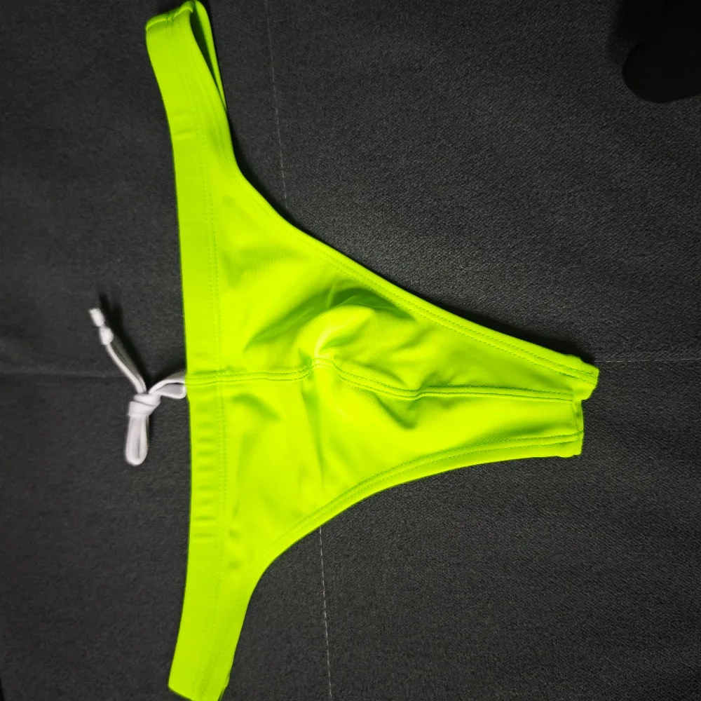 multi-style wholesale original image Spotand simple wholesale supply swimming trunks, men's triangular thong S20110103