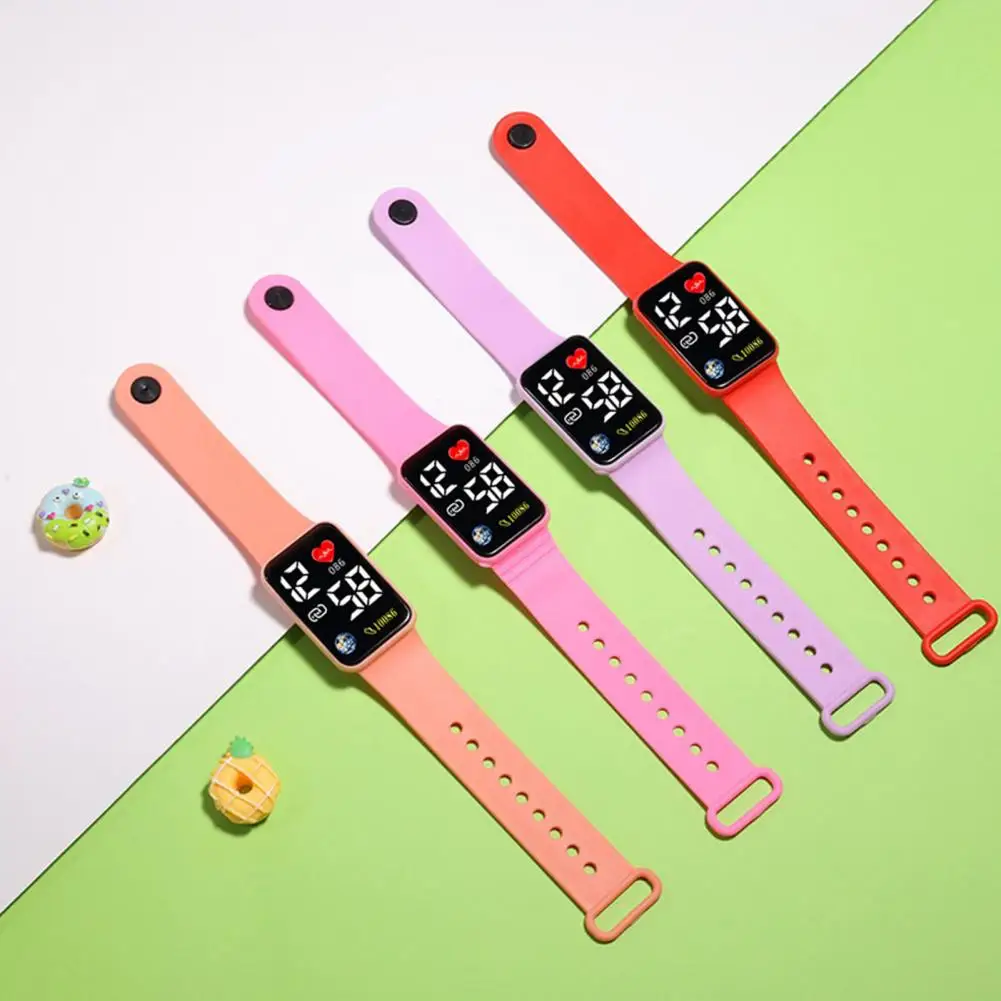 นาฬิกาข้อมือดิจิทัลแนวสปอร์ตลำลองสำหรับเด็กนักเรียนสายซิลิโคนนิ่มนาฬิกาข้อมือ LED อิเล็กทรอนิกส์ปรับได้