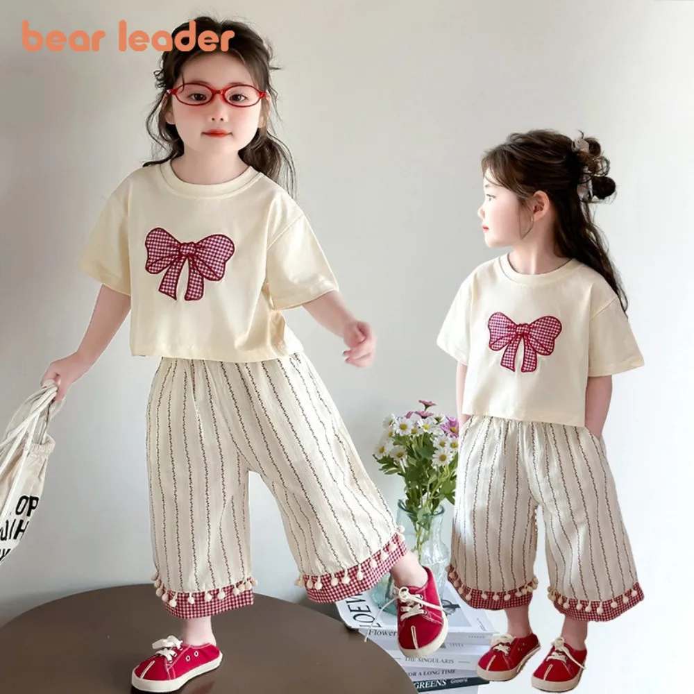 

Summer White Girls Clothes Korean Version Fashionable Casual Children's Clothing Bow Short Sleeved T-shirt Top + Striped Pants