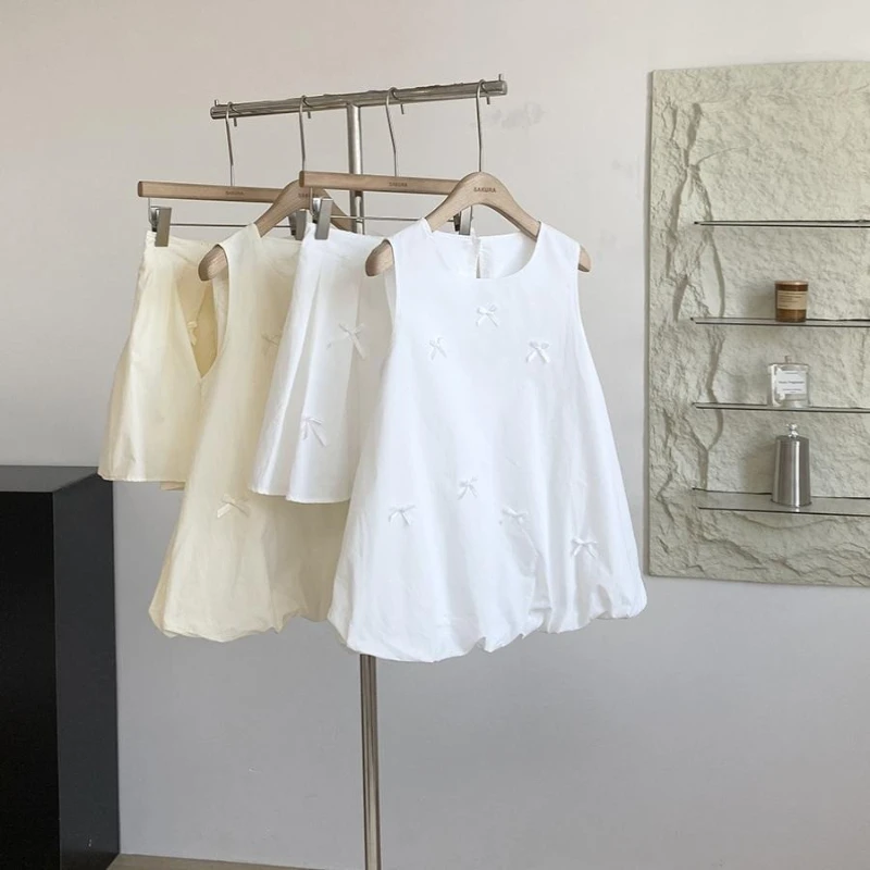 Summer new French style sweet age reducing loose sleeveless vest+pleated short skirt women solid color elegant two-piece set