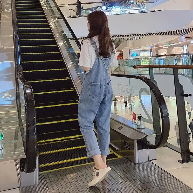 Tute da donna Salopette blu lavata in denim stile coreano Pantaloni larghi casual Pagliaccetti da donna con tasca Vintage Spring Chic femminile