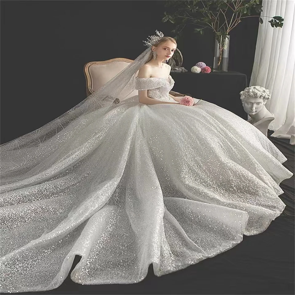 Abito da sposa glitter personalizzato Abito da ballo 2025 Al largo della spalla Nuovo stile per donna Sweep Train Abiti da sposa Abiti da sposa