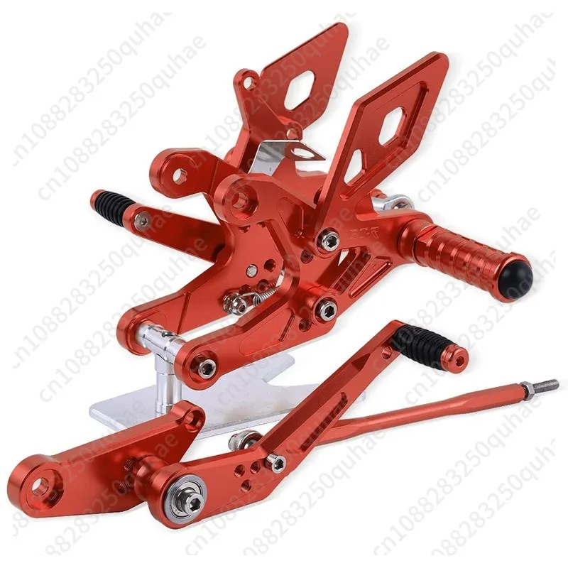 Modified raised pedal rear shift assembly
