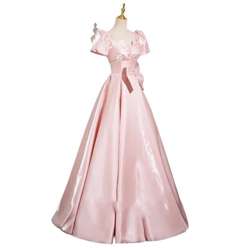 2025 New Women's Pink Satin Dress Fashionable, Slim and Elegant Annual Meeting Bow Decoration Long Back Strap Dress