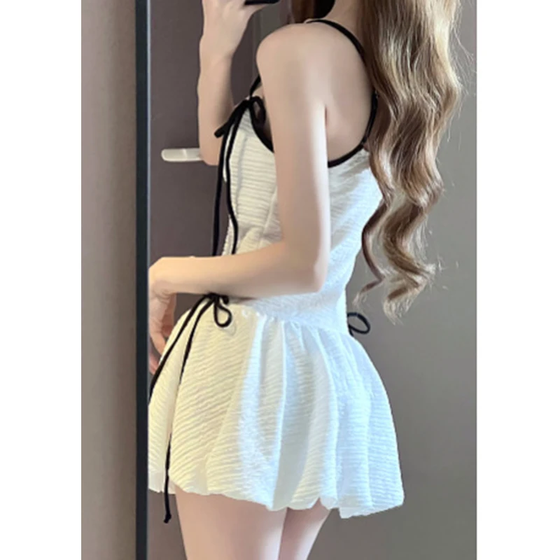 Vestido elegante, traje de baño a la moda para mujer, traje de baño ajustado de una pieza con tirantes y lazo, nuevo traje de baño de estilo francés para niñas 2025
