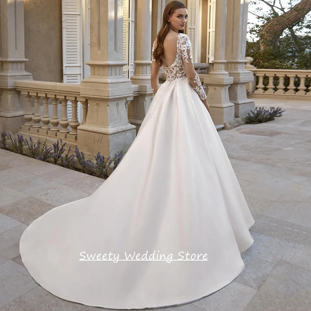 Classic Bride Wedding Dress Customized Long Sleeves V Neck Sequined Applique  Sweep Train Satin Ball Gown Bridal Dresses