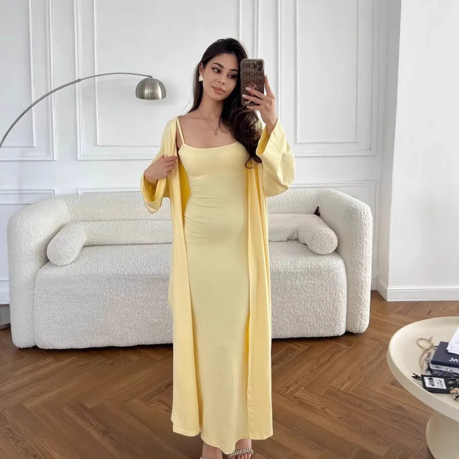 

2025 New Women's Fashionable and Sexy Slim Fit Sleeveless Suspender Dress with Hip Wrap and Cardigan Set