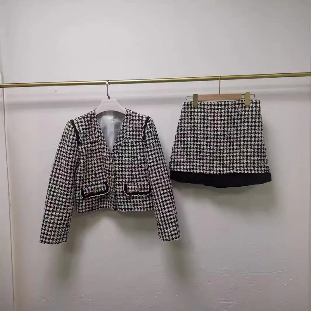 Women's grey plaid two piece suit with casual blazer or stylish mini skirt