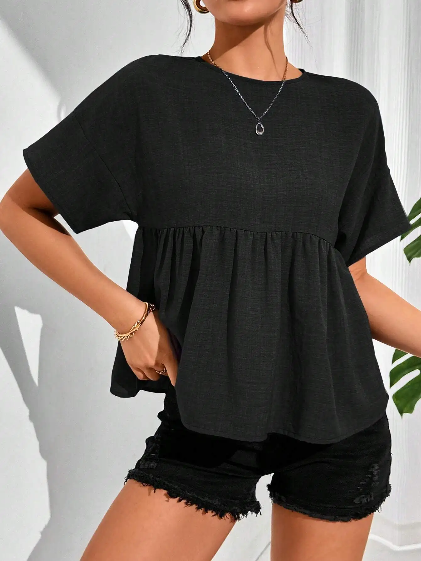 

Женская летняя однотонная свободная блузка с круглым вырезом и короткими рукавами