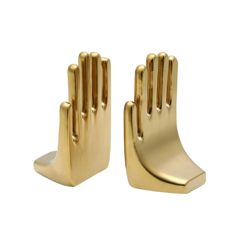 Modern simple abstract palm  electroplated ceramic book lean  bookcase desktop  creative light luxury ornaments