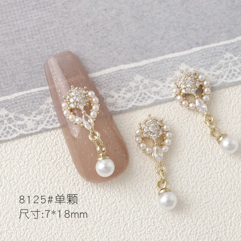 Nagelkunst-Schmuck mit Strass & Zirkonia, Perlenanhänger, Knoten-, Blumen- & Herzdesigns, Trendiges Influencer-Style Nagelzubehör