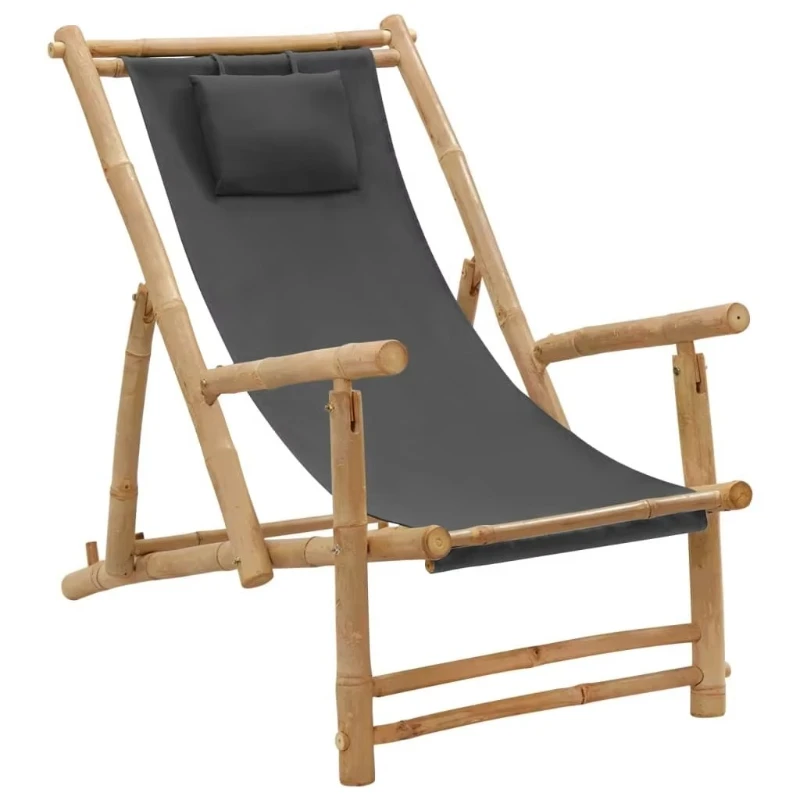 

Garden with dark grey bamboo and canvas loungers