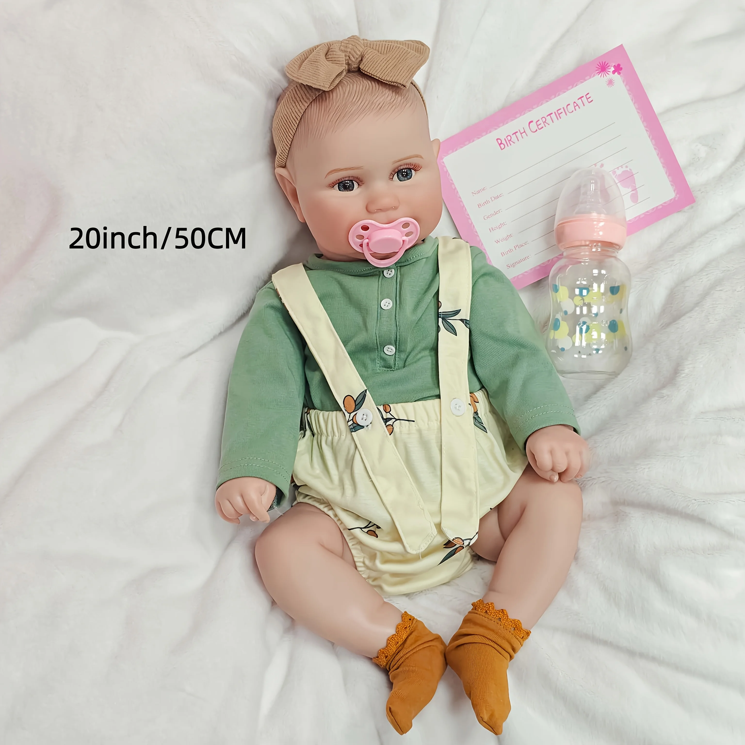 

20-дюймовая виниловая кукла-реборн, зеленая одежда, синие глаза, изысканные черты лица, подвижная, в цветной коробке, праздничный подарок, сувенир