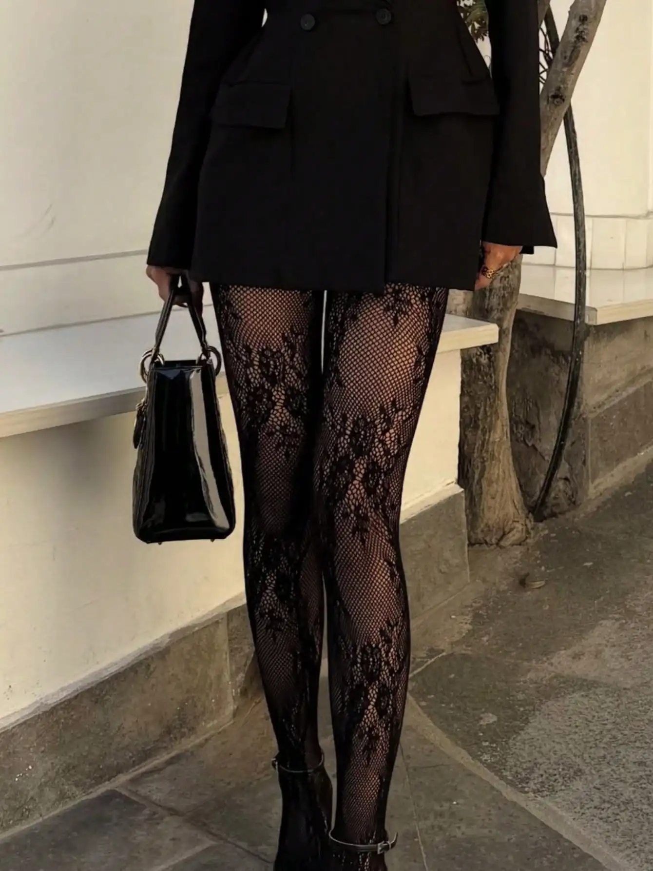 1 Pair – Black rose-patterned fishnet tights; style with a little black dress, pointed-toe heels, and a blazer.