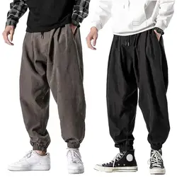 Pantaloni Harem da uomo pantaloni da jogging elastici in vita tinta unita pantaloni larghi 2023 pantaloni con coulisse pantaloni con cavallo a goccia pantaloni Casual Hip Hop