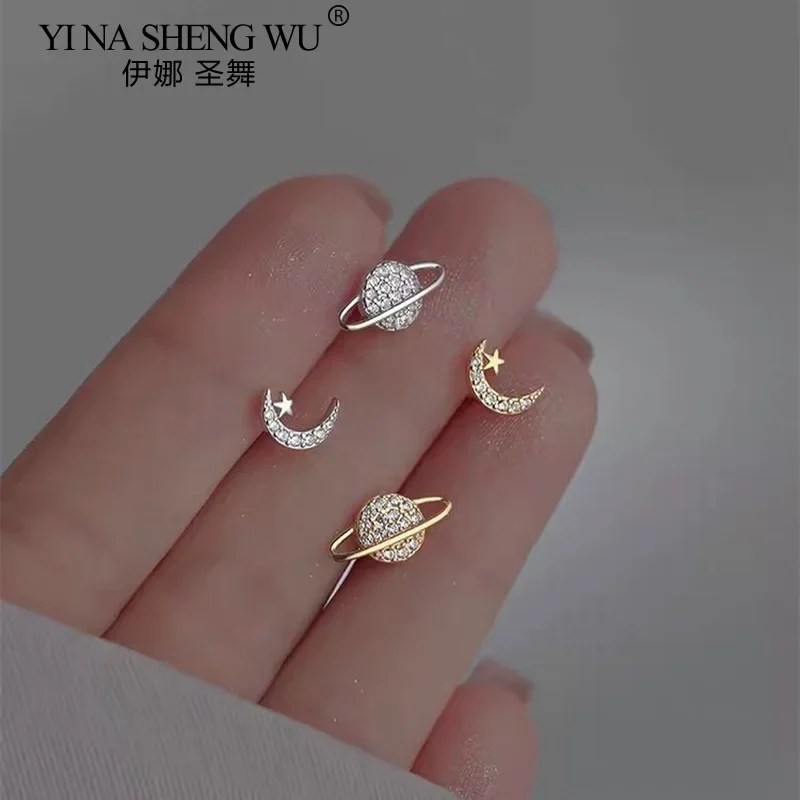 أقراط كوكب عصرية فضية اللون ثقب للنساء نجمة القمر كريستال الزركون الأذن مربط إكسسوارات الارتداء اليومي هدية للفتيات