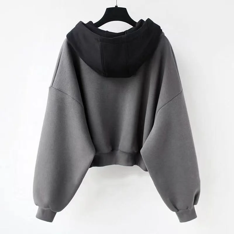 Felpa con cappuccio in due pezzi finta moda per donna 2025 Primavera Autunno Splicing Design Sense Cappotto con cappuccio Abiti popolari coreani