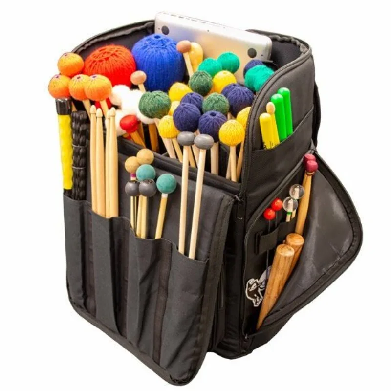 timpani oversized marimba mallets drumsticks sheet music backpack percussion