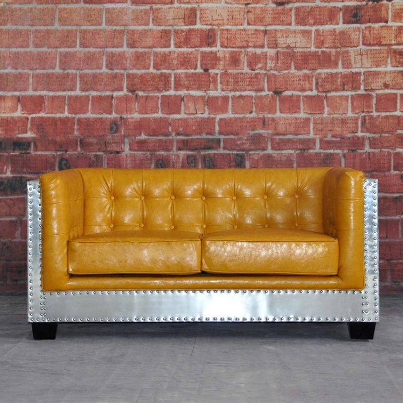 Industrial style aluminum leather rivet imitation leather sofa