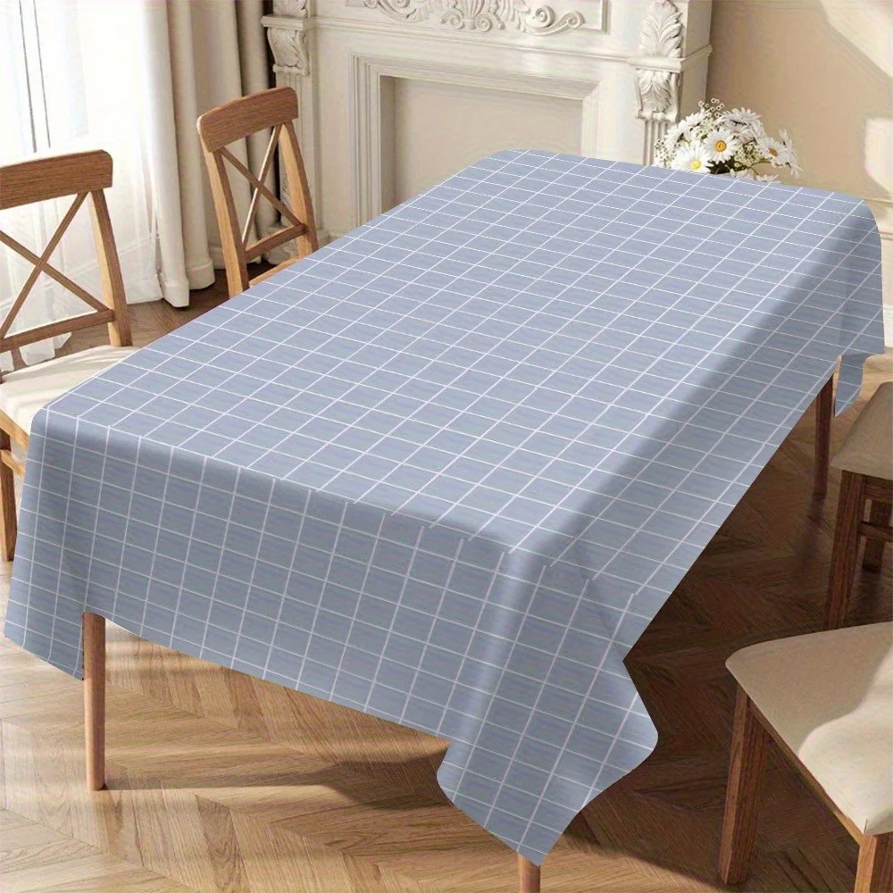 Fashionable light blue and white checkered rectangular tablecloth - made of synthetic polyester fiber.