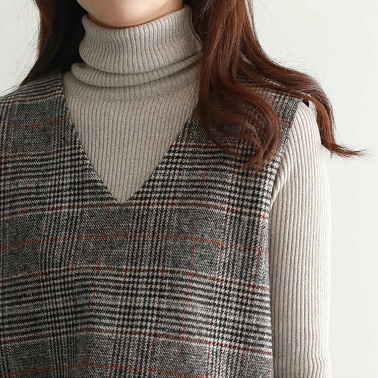 Wiosenna wełniana kamizelka w kratę Dr Slimming plus size z rozcięciem z boku, spódnica midi Dr o artystycznym kroju do pracy.