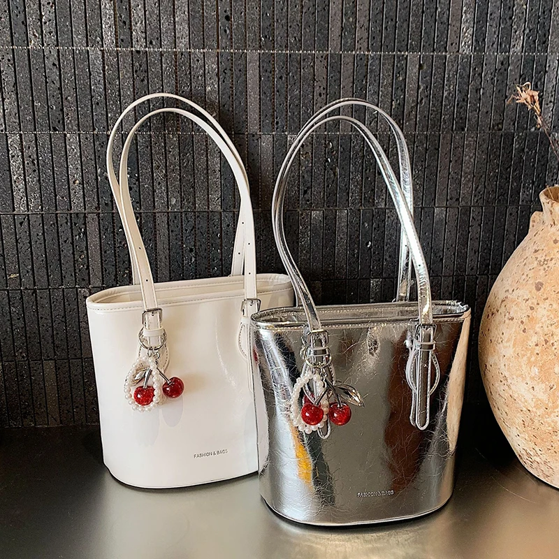 

Модные ретро-сумки-ведра из искусственной кожи для женщин, высококачественные простые однотонные вместительные сумки через плечо, новинка весны 2026, универсальные сумки