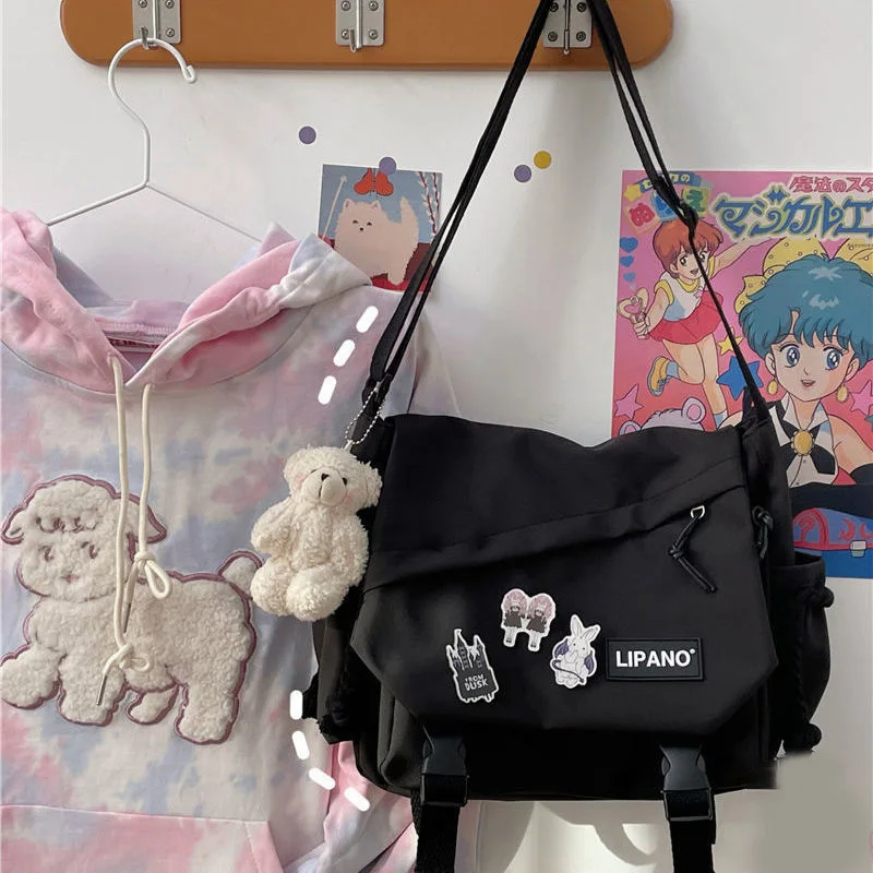 Borsa a tracolla da donna Borsa a tracolla da uomo di grande capacità Coreano giapponese Harajuku JK Borsa a tracolla per studenti in tela di moda